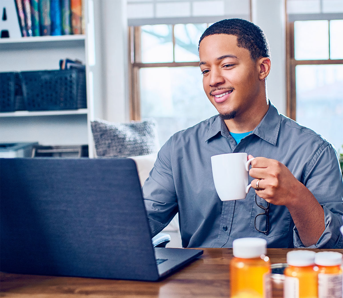 Man browsing on laptop